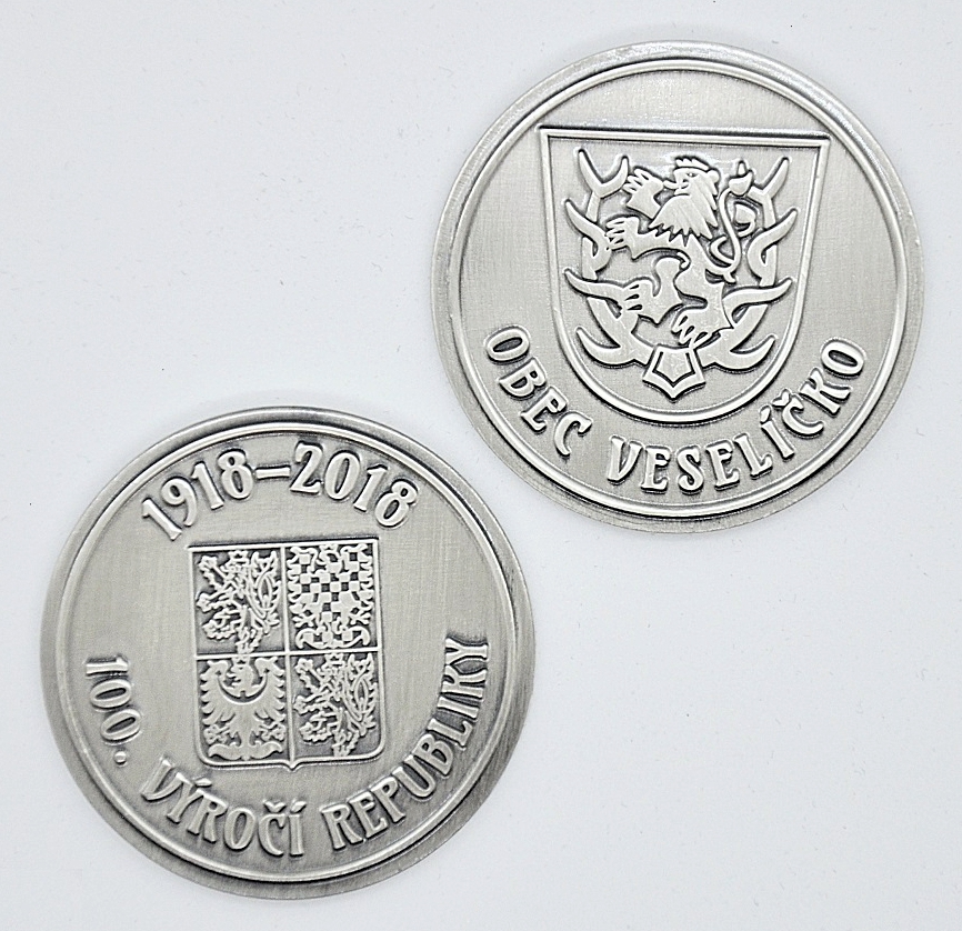 Zakázková výroba oboustranných mincí.