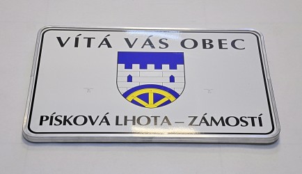Vítací cedule pro označení vjezdu do obce Písková Lhota.