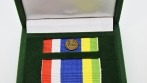 Detail klopové stužky hasičské pamětní medaile.